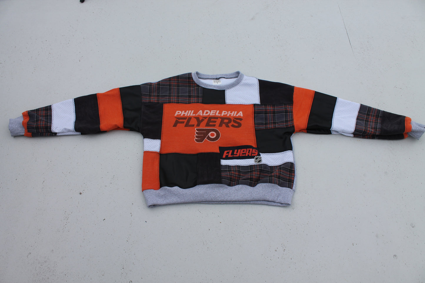 Flyers vegan leather x plaid patchwork crew neck